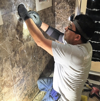 DeVinney Plumbing technician working on plumbing repairs